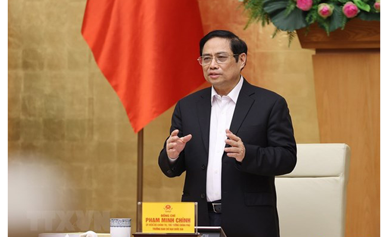 Thủ tướng Phạm Minh Chính chủ trì sơ kết công tác phòng, chống dịch COVID-19 trong đợt bùng phát lần thứ 4. Ảnh: TTXVN