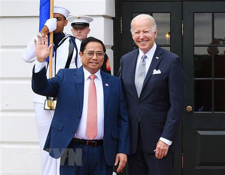 Tổng thống Hoa Kỳ Joseph Robinette Biden Jr. đón Thủ tướng Phạm Minh Chính. Ảnh: TTXVN