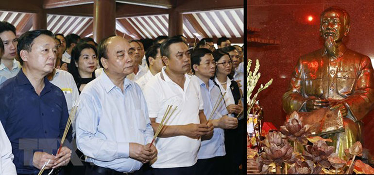 Chủ tịch nước Nguyễn Xuân Phúc và các đại biểu dâng hương tưởng niệm Bác Hồ. Ảnh: TTXVN