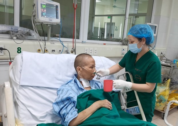 Bệnh nhân 19 đang điều trị tại Bệnh viện Bệnh Nhiệt đới Trung ương - Ảnh: Vietnam+