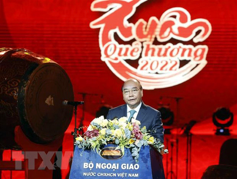 Chủ tịch nước Nguyễn Xuân Phúc phát biểu tại Chương trình Xuân Quê hương năm 2022. Ảnh: TTXVN